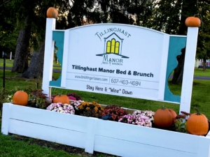 Tillinghast Manor Signw ith Fall Decorations