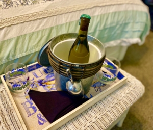 Seneca Room Wine in bucket with glasses