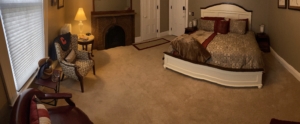 The Cayuga Room - bed view with fireplace