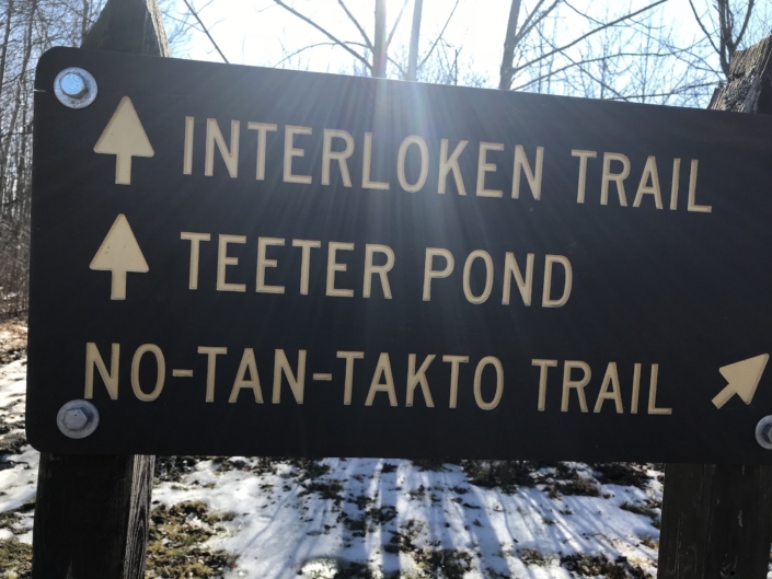 hiking and the lakes Interloken Trail Sign